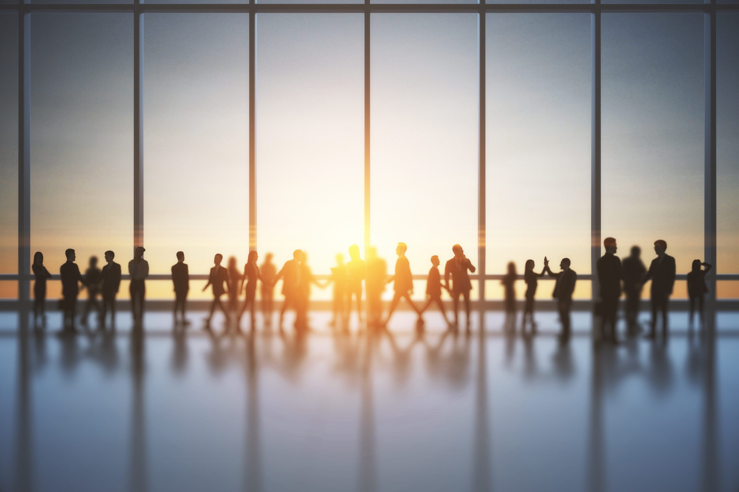 backlit-crowd-of-businessmen-and-women-working-tog-2026-01-11-08-31-59-utc